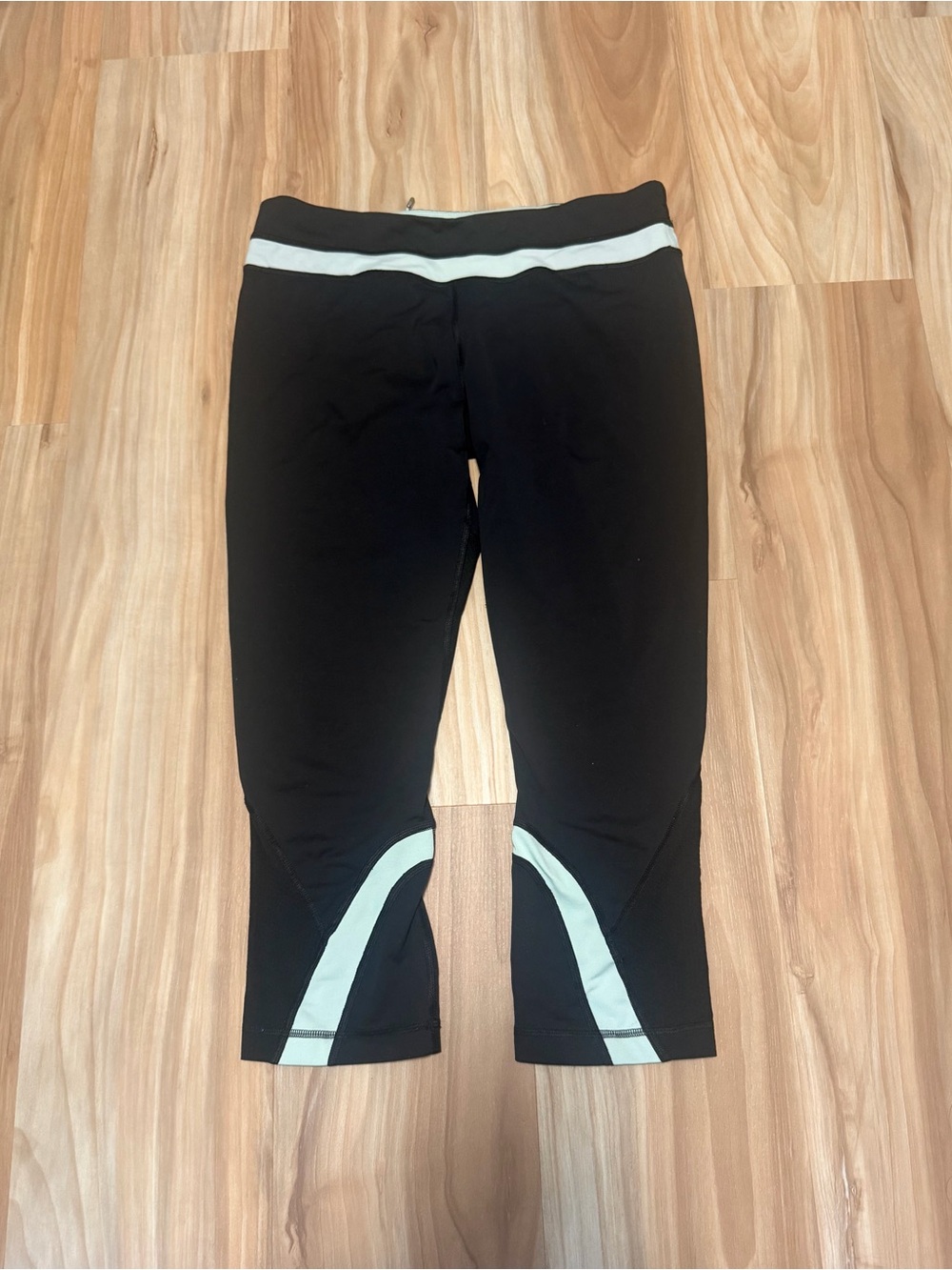 lululemon athletica Black Capri Leggings with Light Blue Trim